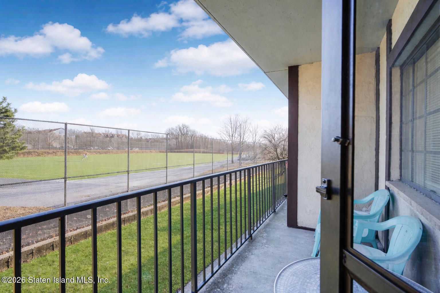 120 Devon Loop, Unit 6 Staten Island, NY 10314 - Photo 9 of 19 a view of a balcony from a window