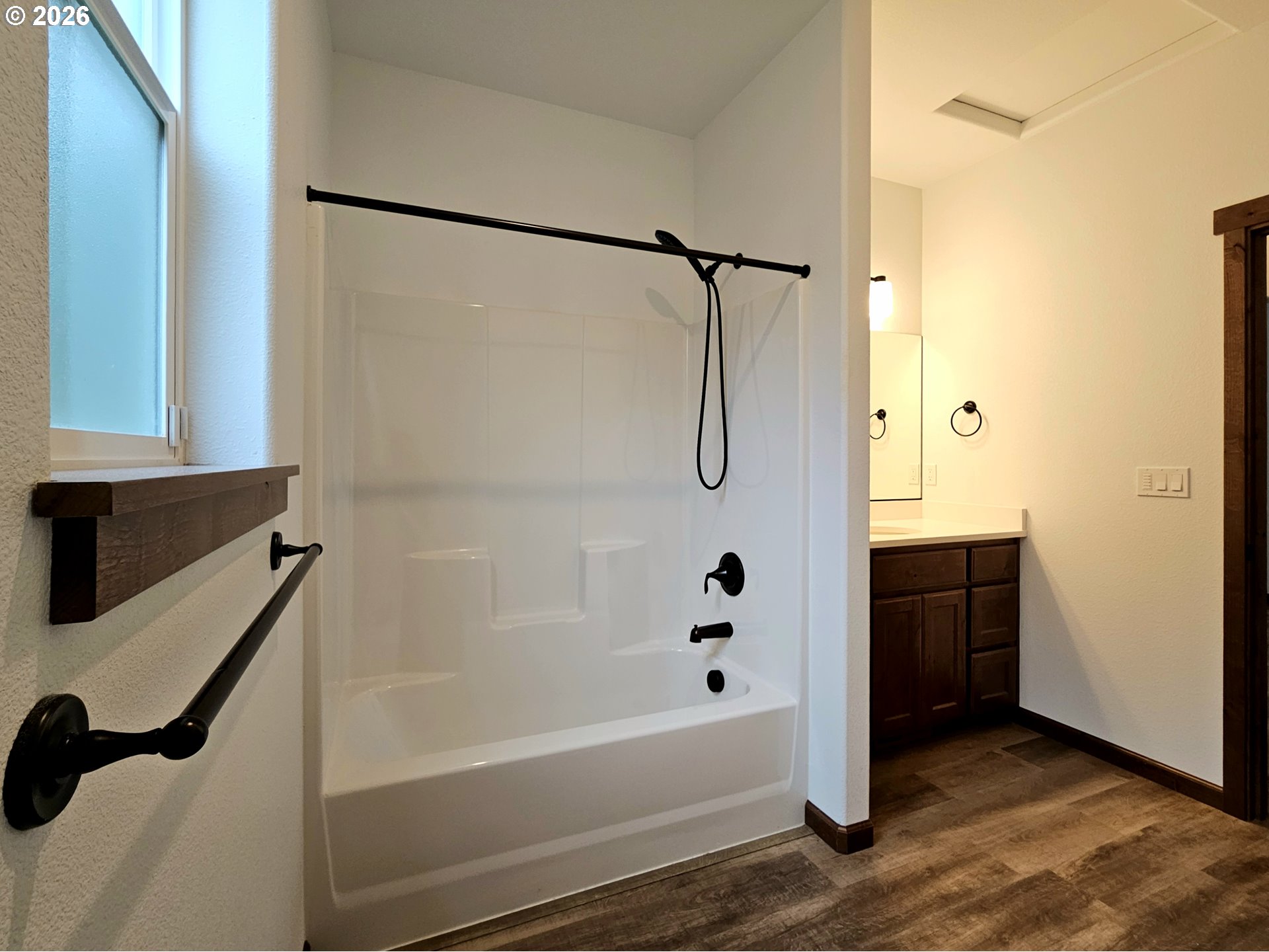 98205 Sunforest Court Brookings, OR 97415 - Photo 28 of 45 a bathroom with a bathtub and a shower