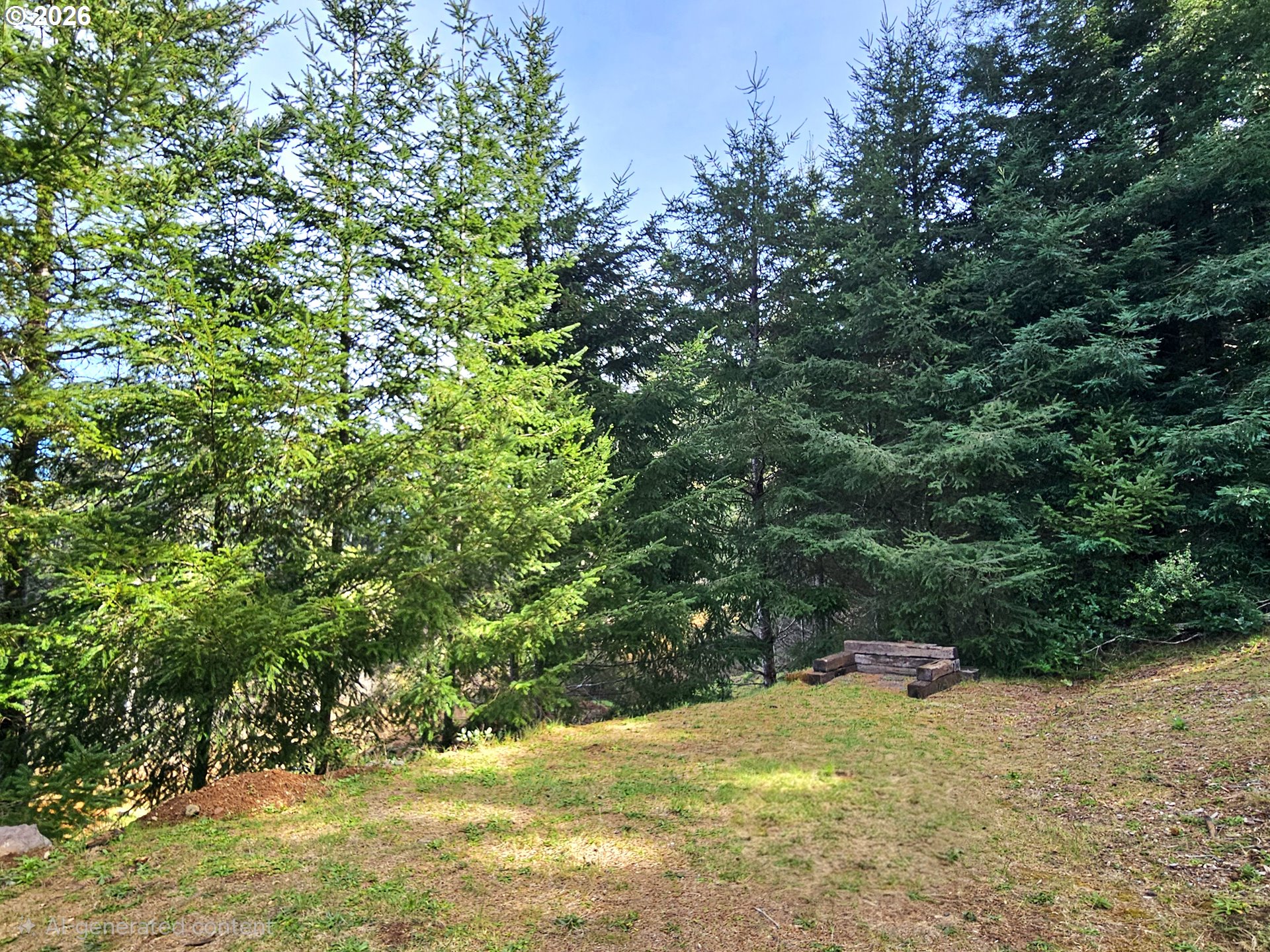 98205 Sunforest Court Brookings, OR 97415 - Photo 39 of 45 a view of a yard with a tree