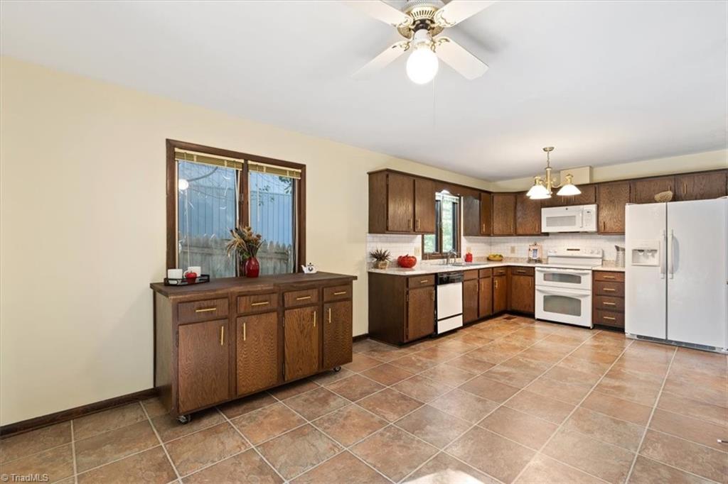 3619 Gramercy Road Greensboro, NC 27410 - Photo 11 of 49 Kitchen with Island. Island is on wheels and can be moved as needed.