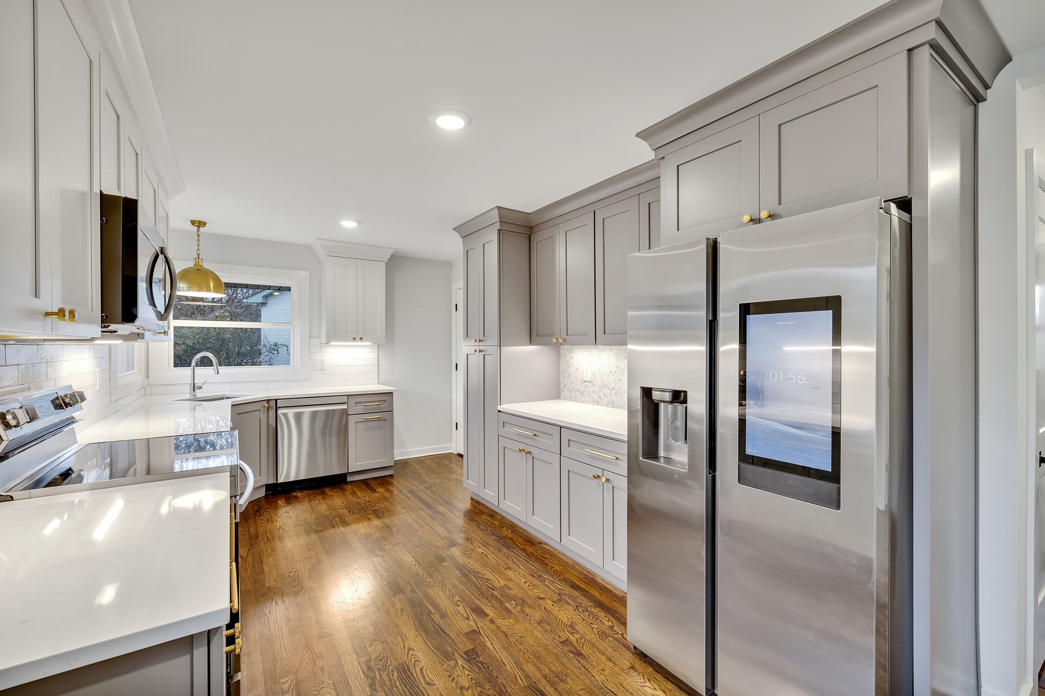 5315 Anchorage Drive Nashville, TN 37220 - Photo 11 of 38 a kitchen with stainless steel appliances a refrigerator and a stove top oven