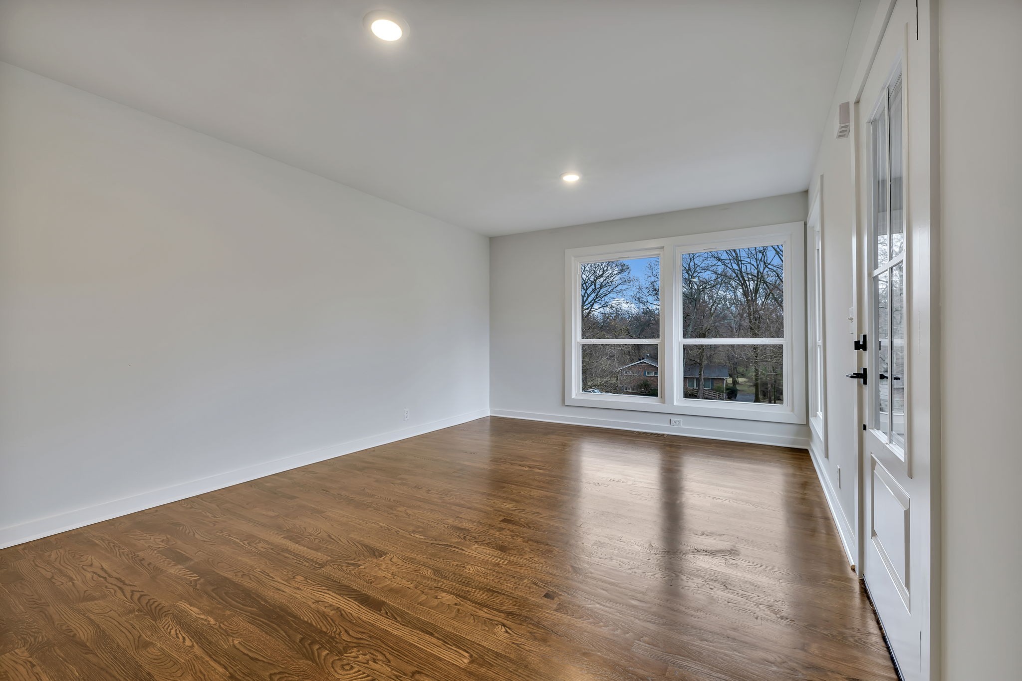 5315 Anchorage Drive Nashville, TN 37220 - Photo 14 of 38 a view of empty room with wooden floor and fan
