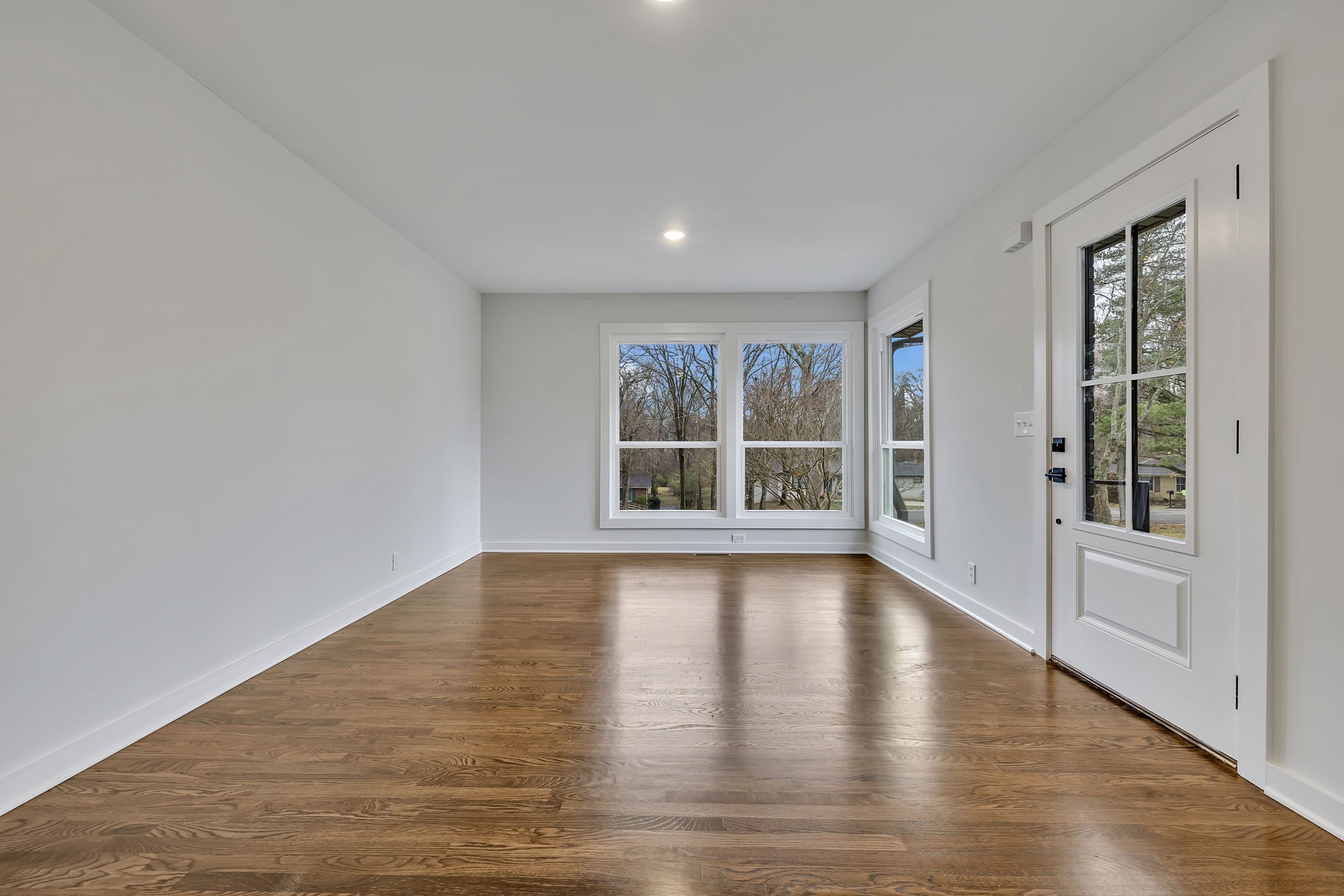 5315 Anchorage Drive Nashville, TN 37220 - Photo 15 of 38 a view of an empty room with a window and wooden floor