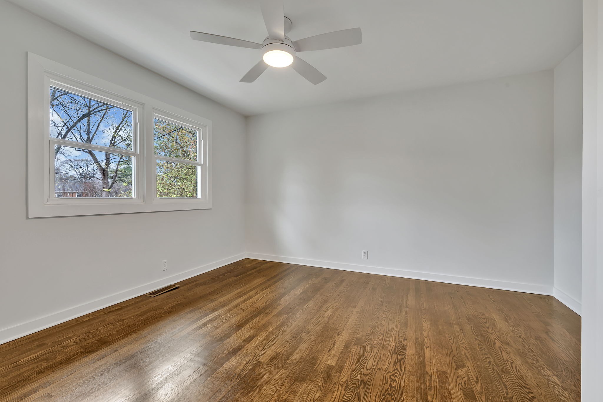 5315 Anchorage Drive Nashville, TN 37220 - Photo 21 of 38 a view of empty room with wooden floor and fan