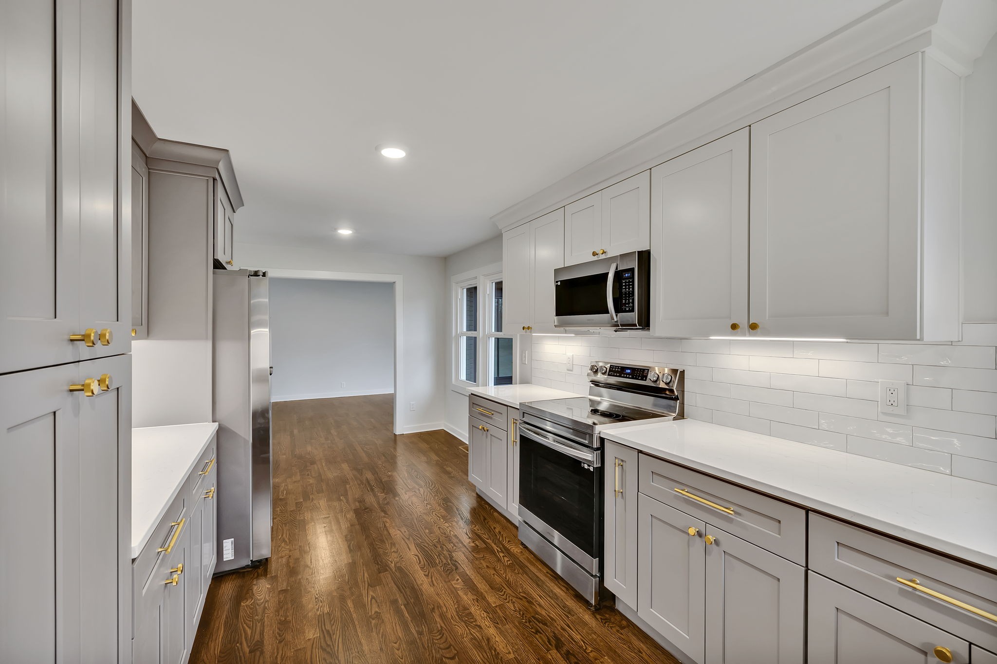 5315 Anchorage Drive Nashville, TN 37220 - Photo 24 of 38 a kitchen with stainless steel appliances granite countertop a stove a sink and a refrigerator