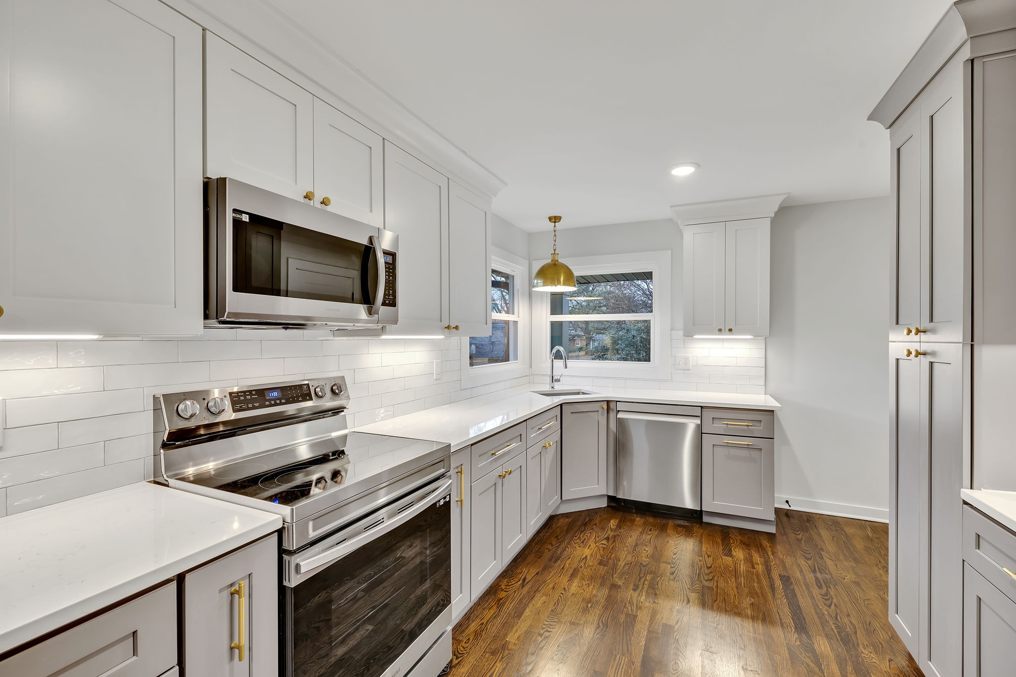 5315 Anchorage Drive Nashville, TN 37220 - Photo 9 of 38 a kitchen with a sink stove and microwave