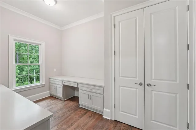 a bathroom with a sink a mirror and a vanity