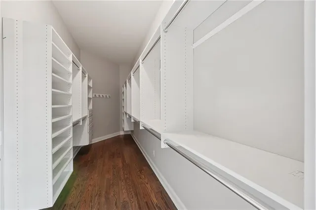 an aerial view of a house with a yard and garden