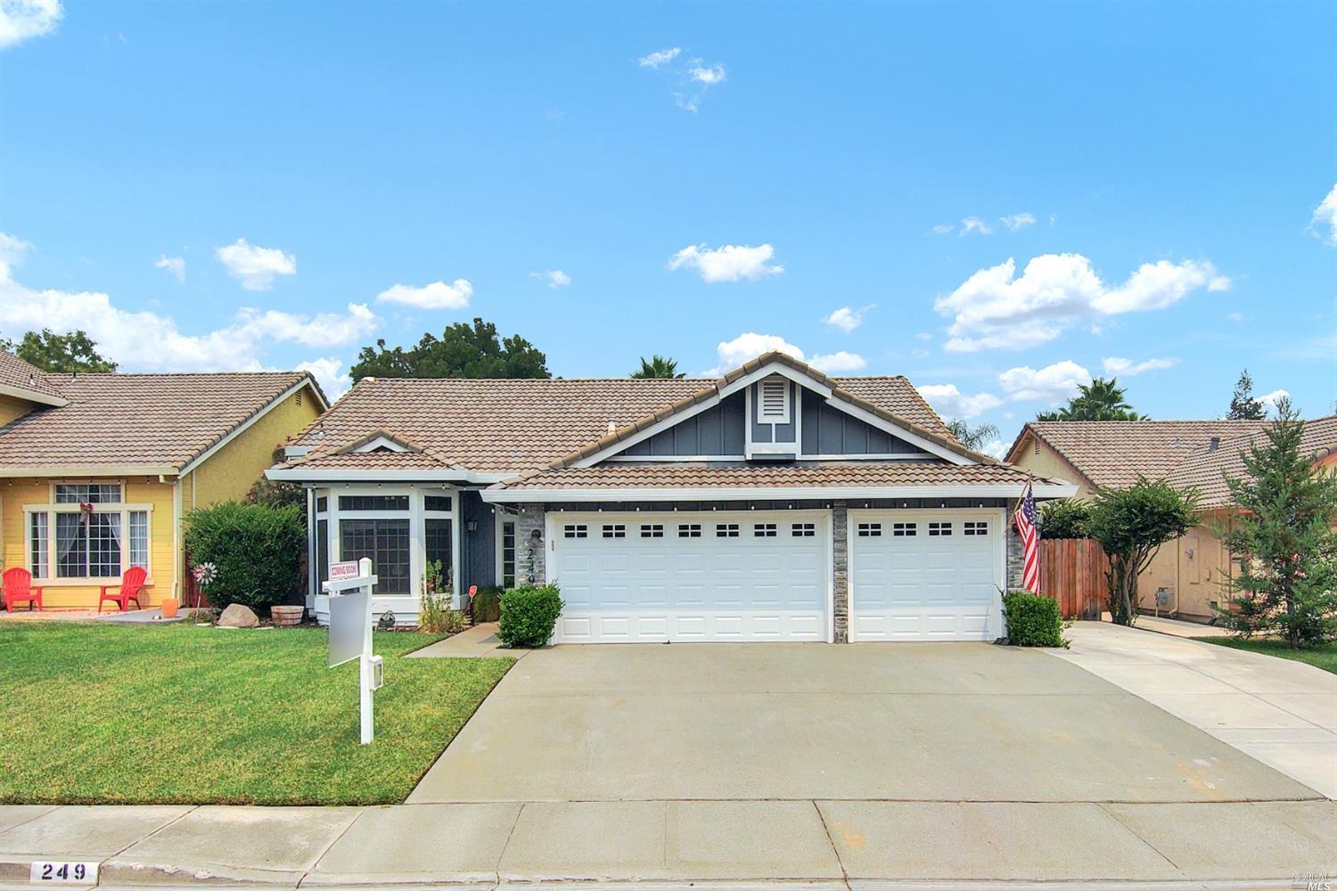 249 Lighthouse Way Vacaville, CA 95688 - Photo 1 of 1 a front view of a house with a garden and yard