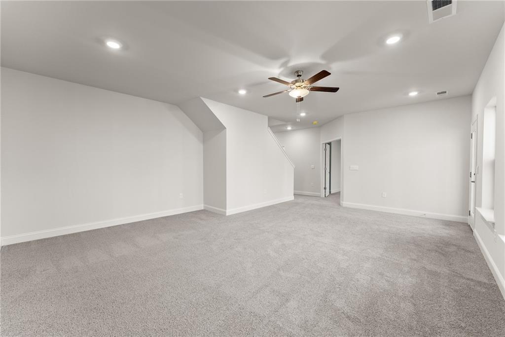 478 Magnolia Grove Place Cornelia, GA 30531 - Photo 21 of 38 an empty room with fan and a ceiling fan