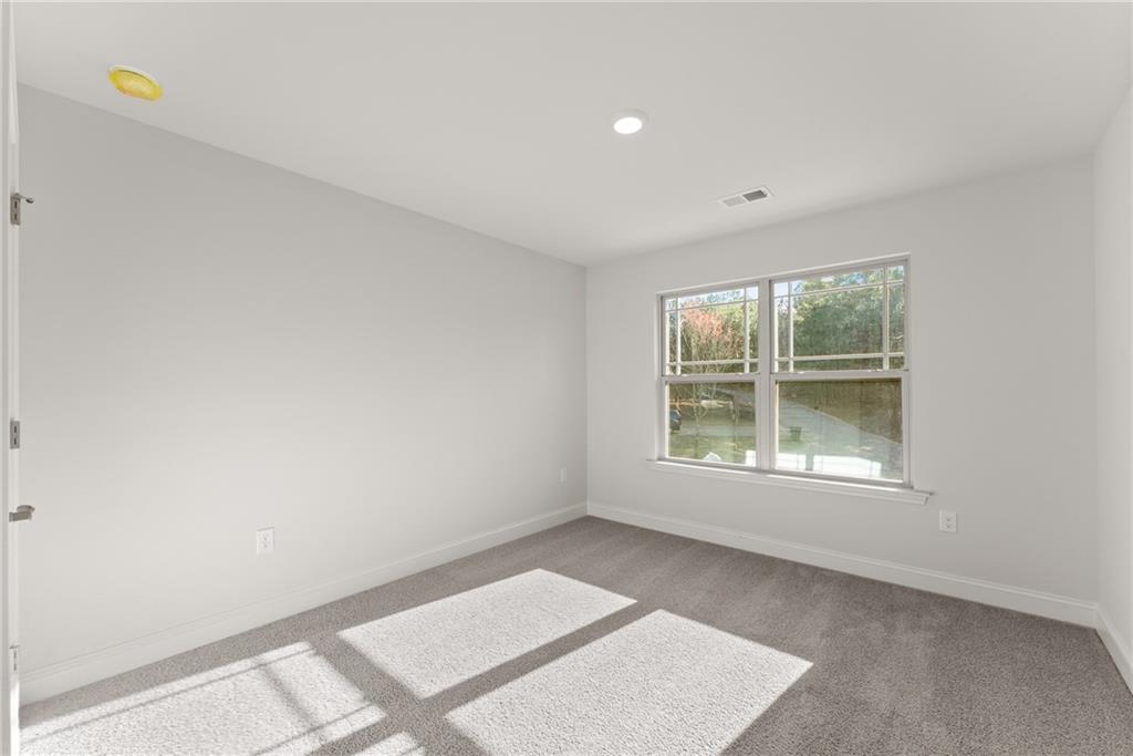 478 Magnolia Grove Place Cornelia, GA 30531 - Photo 25 of 38 an empty room with a window