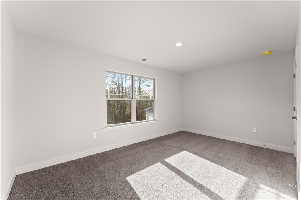 478 Magnolia Grove Place Cornelia, GA 30531 - Photo 29 of 38 an empty room with a window