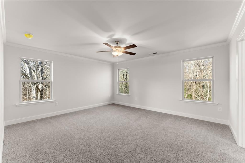 478 Magnolia Grove Place Cornelia, GA 30531 - Photo 32 of 38 a view of an empty room with a window