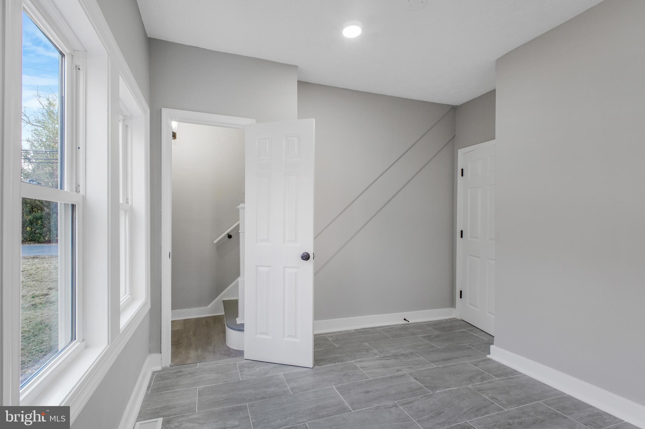 125 High Street Luray, VA 22835 - Photo 12 of 31 a view of an empty room with a hallway