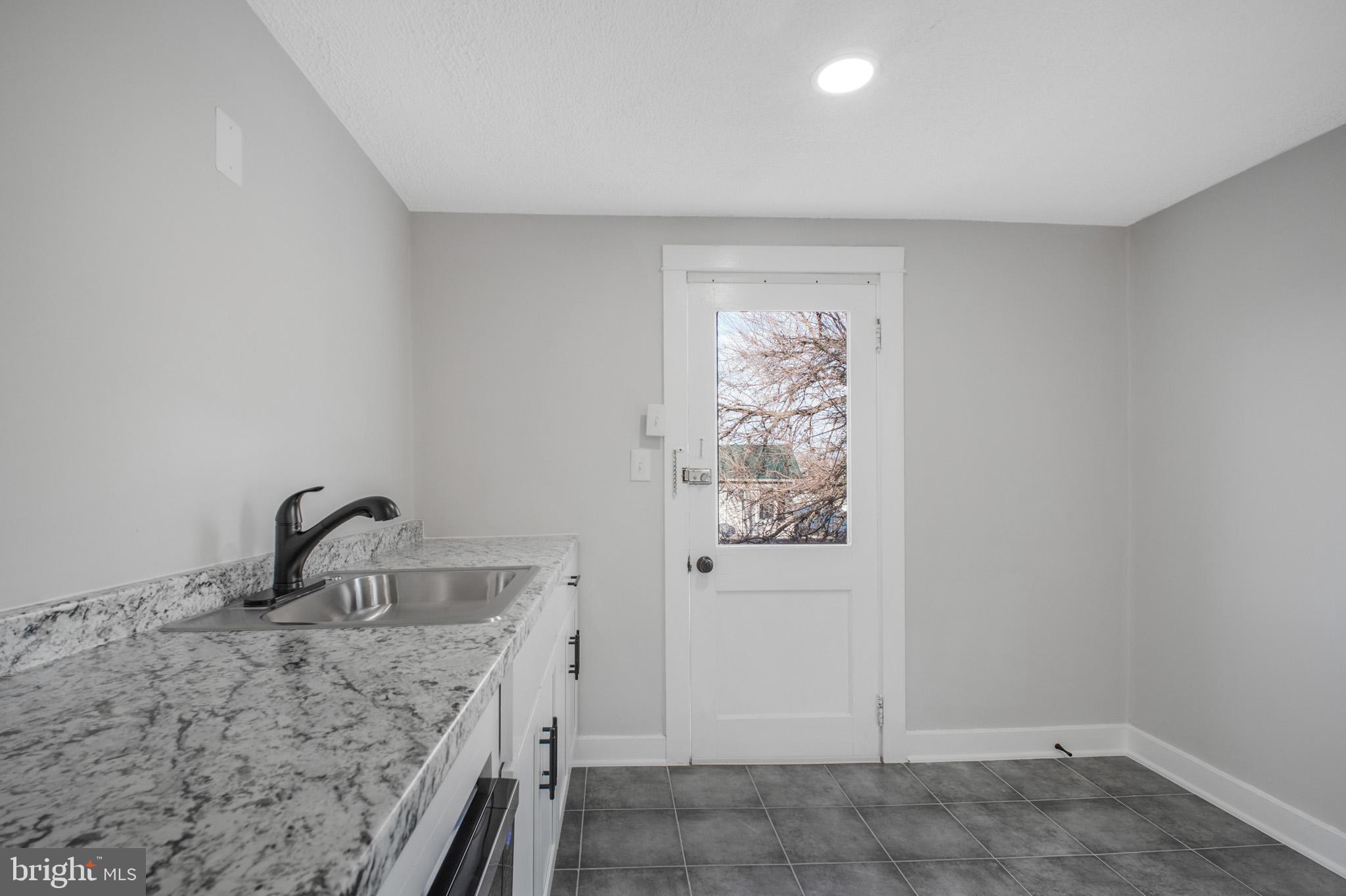 125 High Street Luray, VA 22835 - Photo 18 of 31 a room with a sink and a window