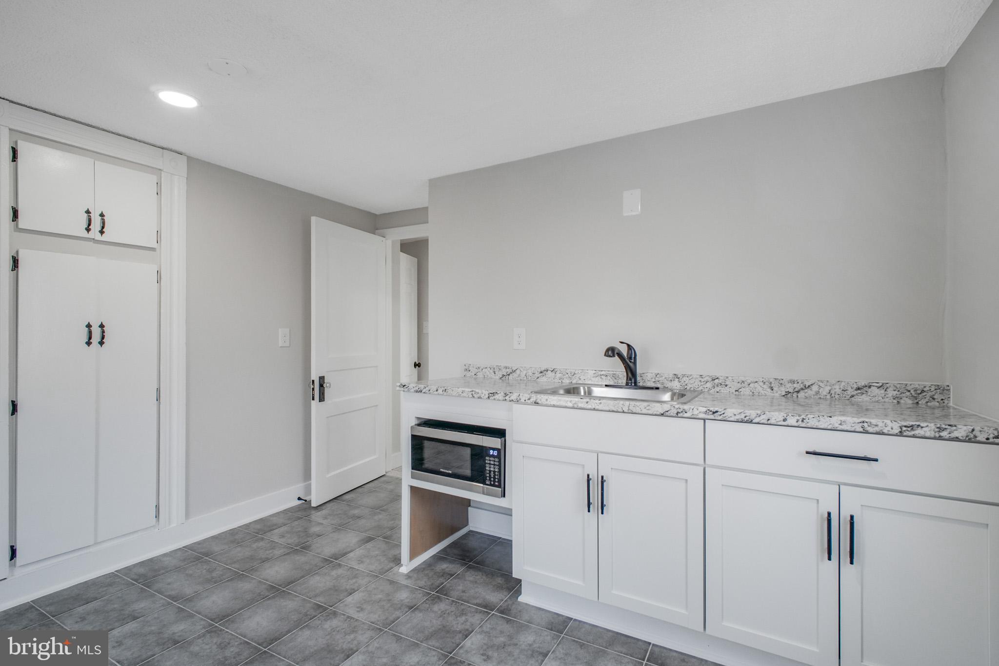 125 High Street Luray, VA 22835 - Photo 19 of 31 a view of cabinets with wooden floor