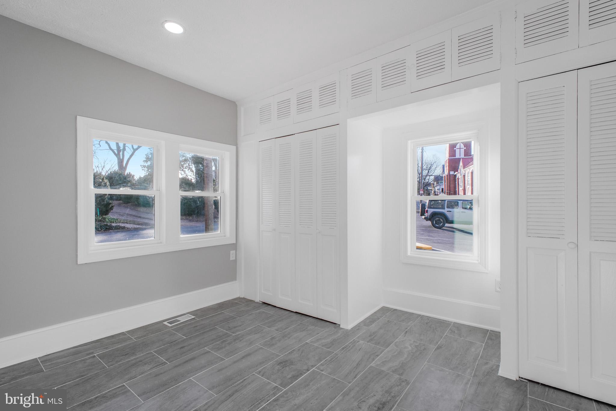 125 High Street Luray, VA 22835 - Photo 5 of 31 a view of livingroom with window and hardwood floor