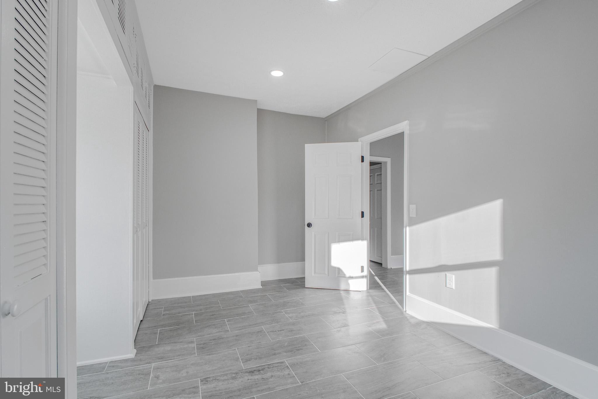 125 High Street Luray, VA 22835 - Photo 6 of 31 a view of empty room with wooden floor