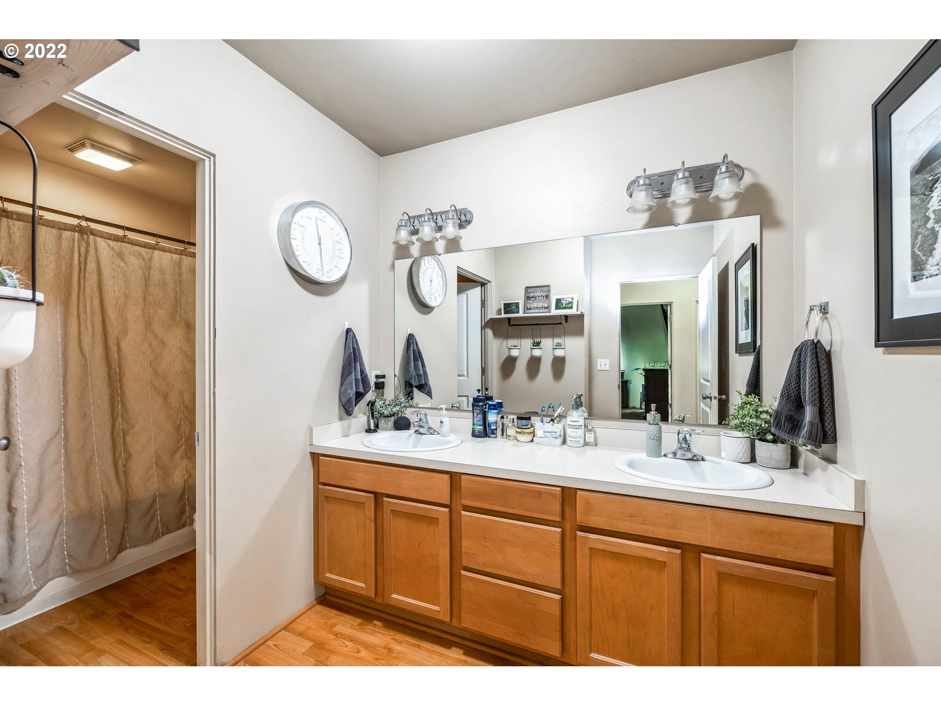 1849 8th Street Springfield, OR 97477 - Photo 16 of 32 a bathroom with a sink double vanity and a mirror