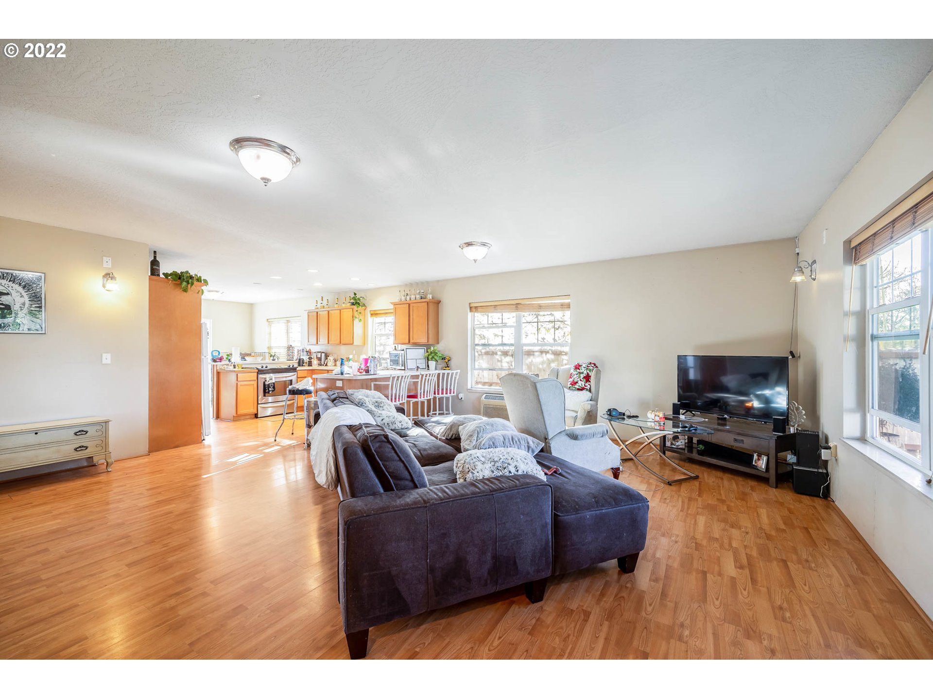 1849 8th Street Springfield, OR 97477 - Photo 23 of 32 a living room with furniture and a flat screen tv