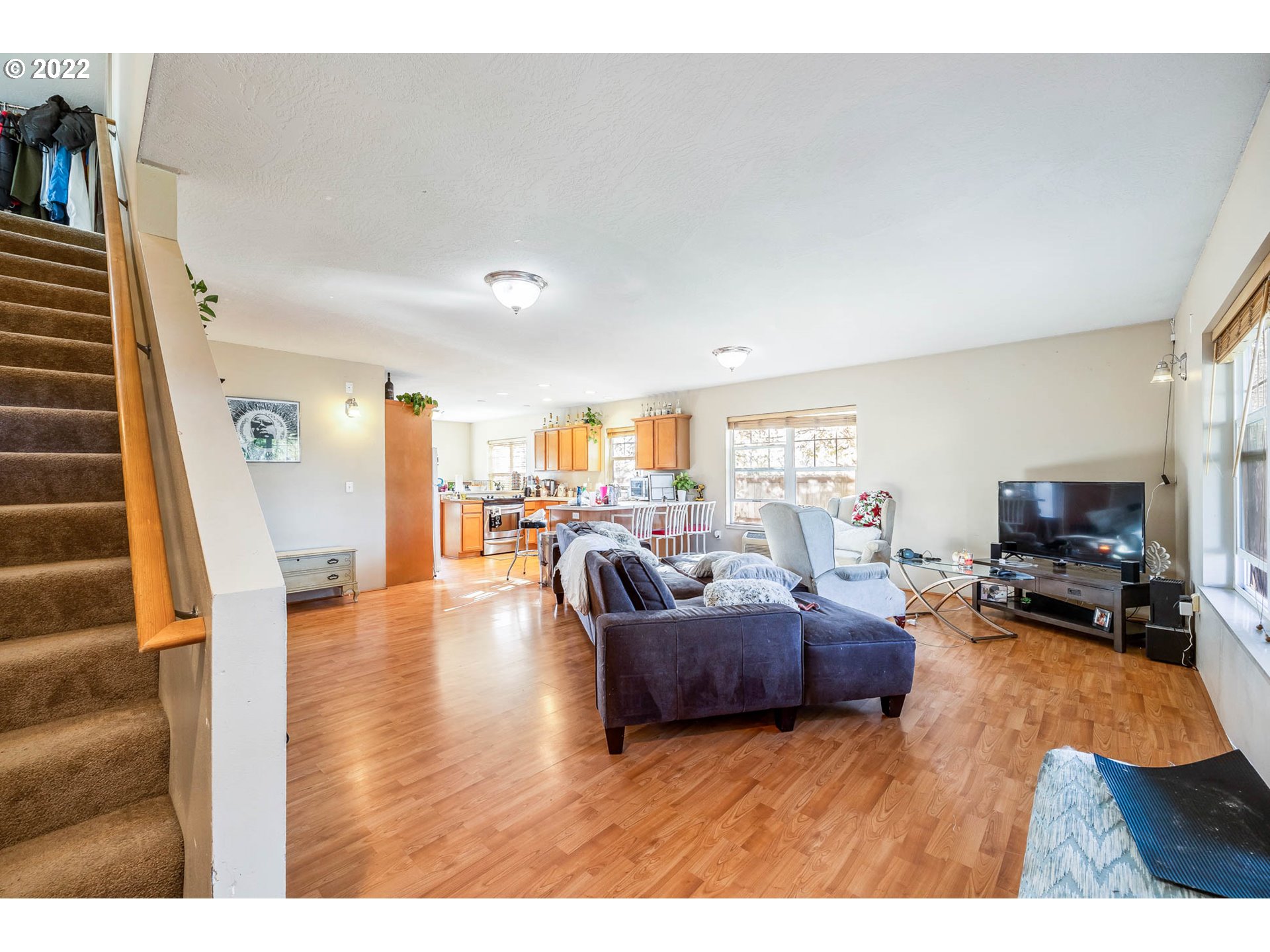 1849 8th Street Springfield, OR 97477 - Photo 24 of 32 a living room with furniture and a flat screen tv