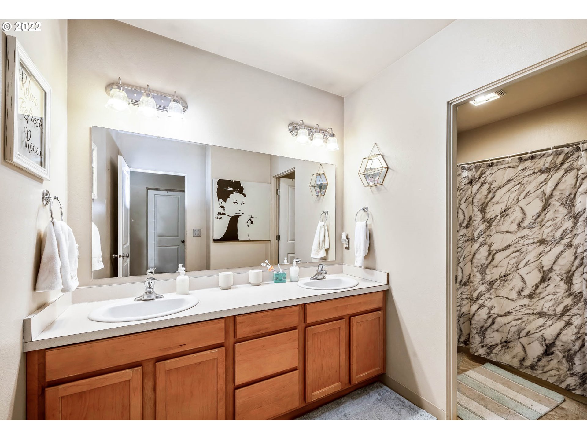 1849 8th Street Springfield, OR 97477 - Photo 27 of 32 a bathroom with a double vanity sink mirror and double
