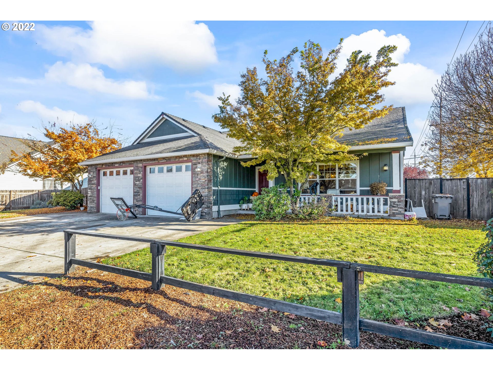 1849 8th Street Springfield, OR 97477 - Photo 3 of 32 a front view of a house with garden