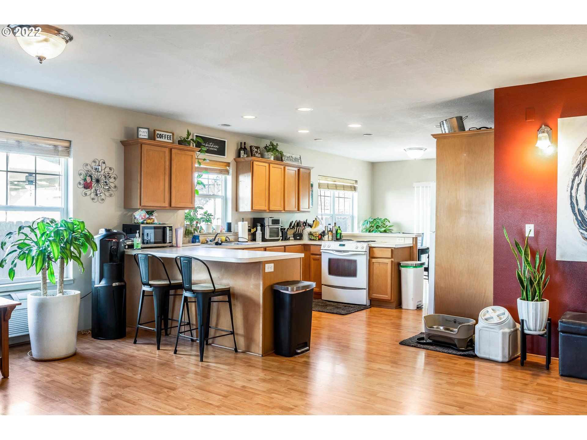 1849 8th Street Springfield, OR 97477 - Photo 9 of 32 a kitchen with a table chairs and potted plant