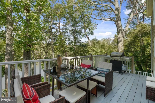 a view of a balcony with furniture