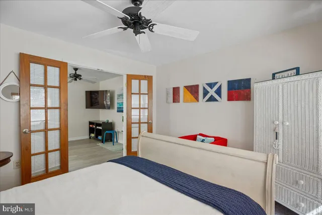 a bedroom with furniture and window