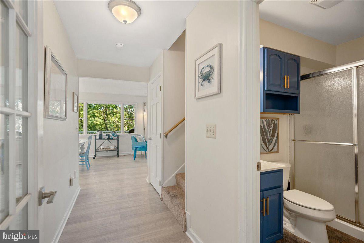 219 Calvert Drive Lusby, MD 20657 - Photo 22 of 51 a bathroom with a toilet sink and shower