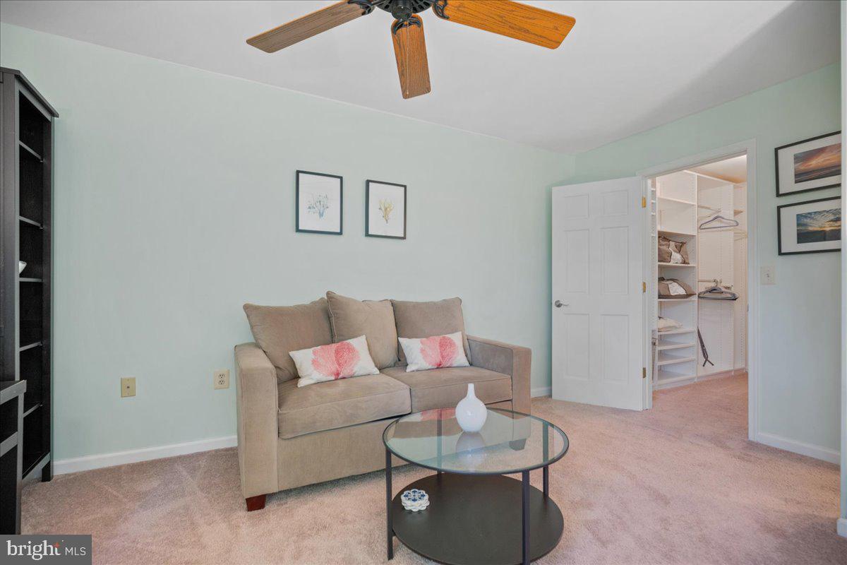 219 Calvert Drive Lusby, MD 20657 - Photo 28 of 51 a living room with furniture and white walls
