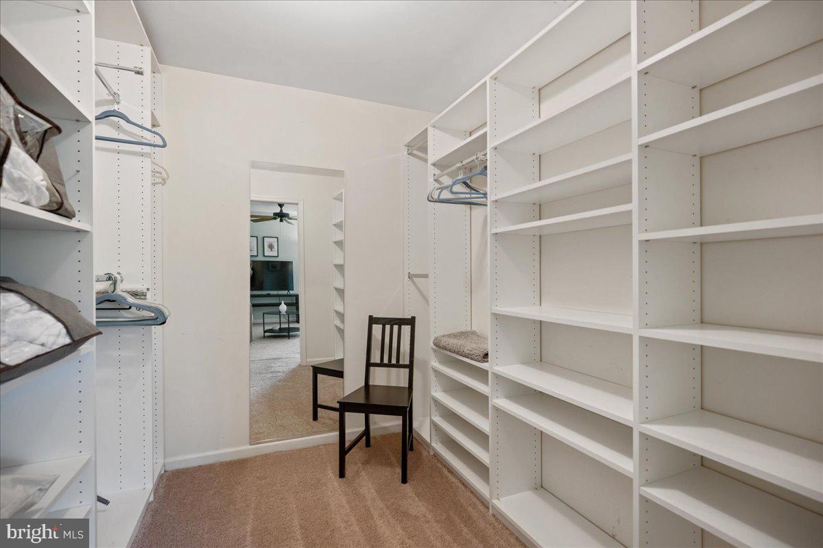 219 Calvert Drive Lusby, MD 20657 - Photo 29 of 51 a view of walk in closet with empty racks