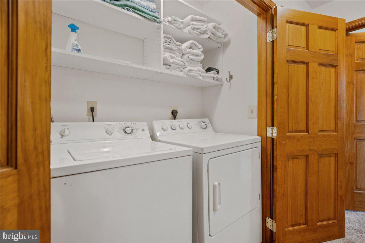 219 Calvert Drive Lusby, MD 20657 - Photo 36 of 51 a utility room with dryer and washer