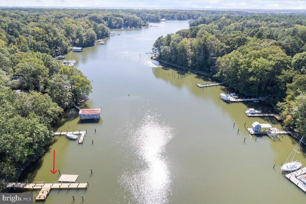219 Calvert Drive Lusby, MD 20657 - Photo 47 of 51 an aerial view of residential houses with outdoor space and lake view