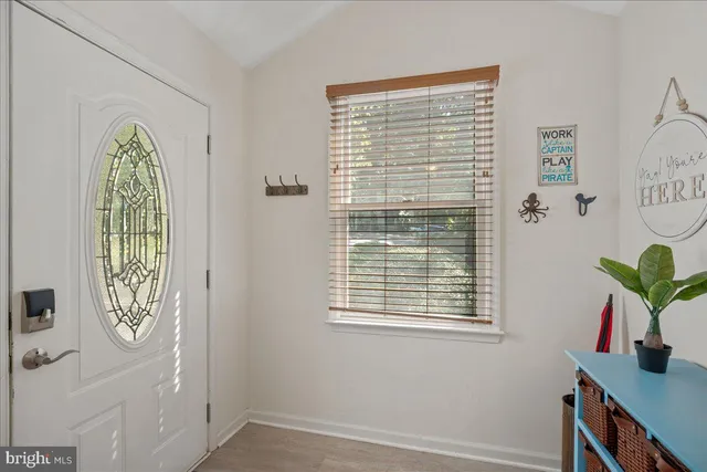a view of an entryway with a window
