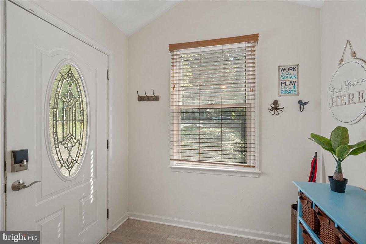 219 Calvert Drive Lusby, MD 20657 - Photo 6 of 51 a view of an entryway with a window
