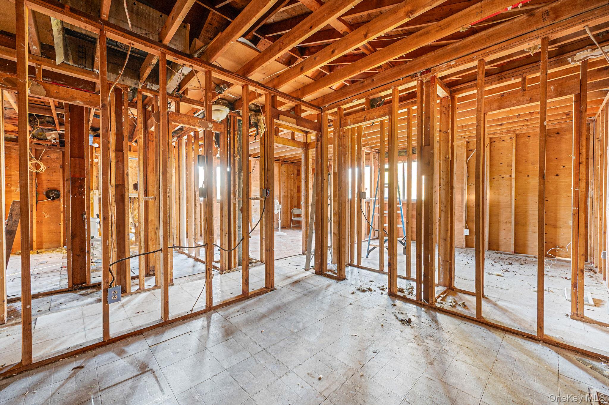 53 Hounslow Road Shirley, NY 11967 - Photo 12 of 18 a view of a room with large windows