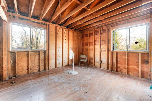 an empty room with windows