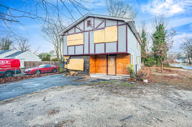 a view of swimming pool with a yard