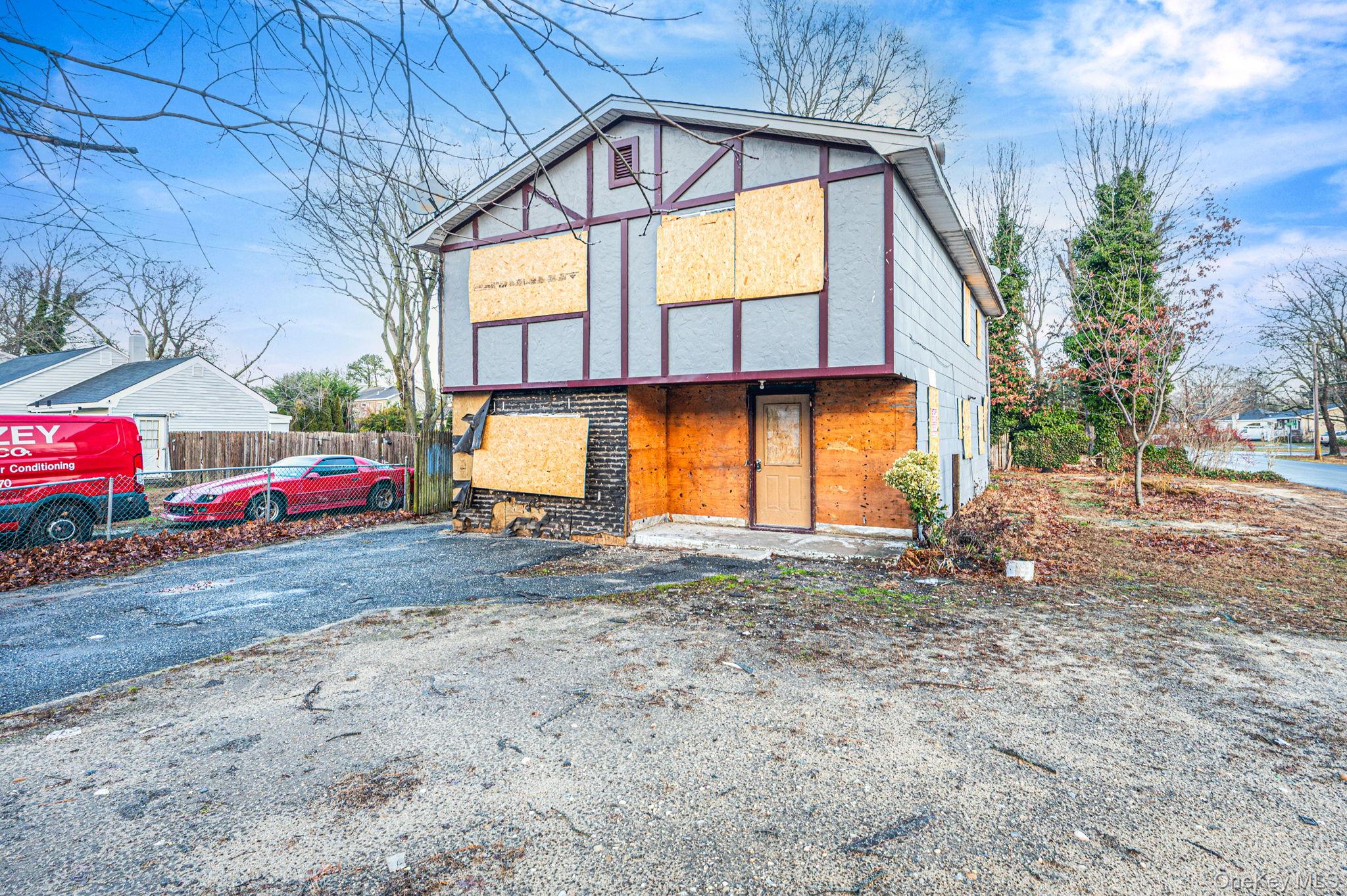 53 Hounslow Road Shirley, NY 11967 - Photo 2 of 18 a view of swimming pool with a yard