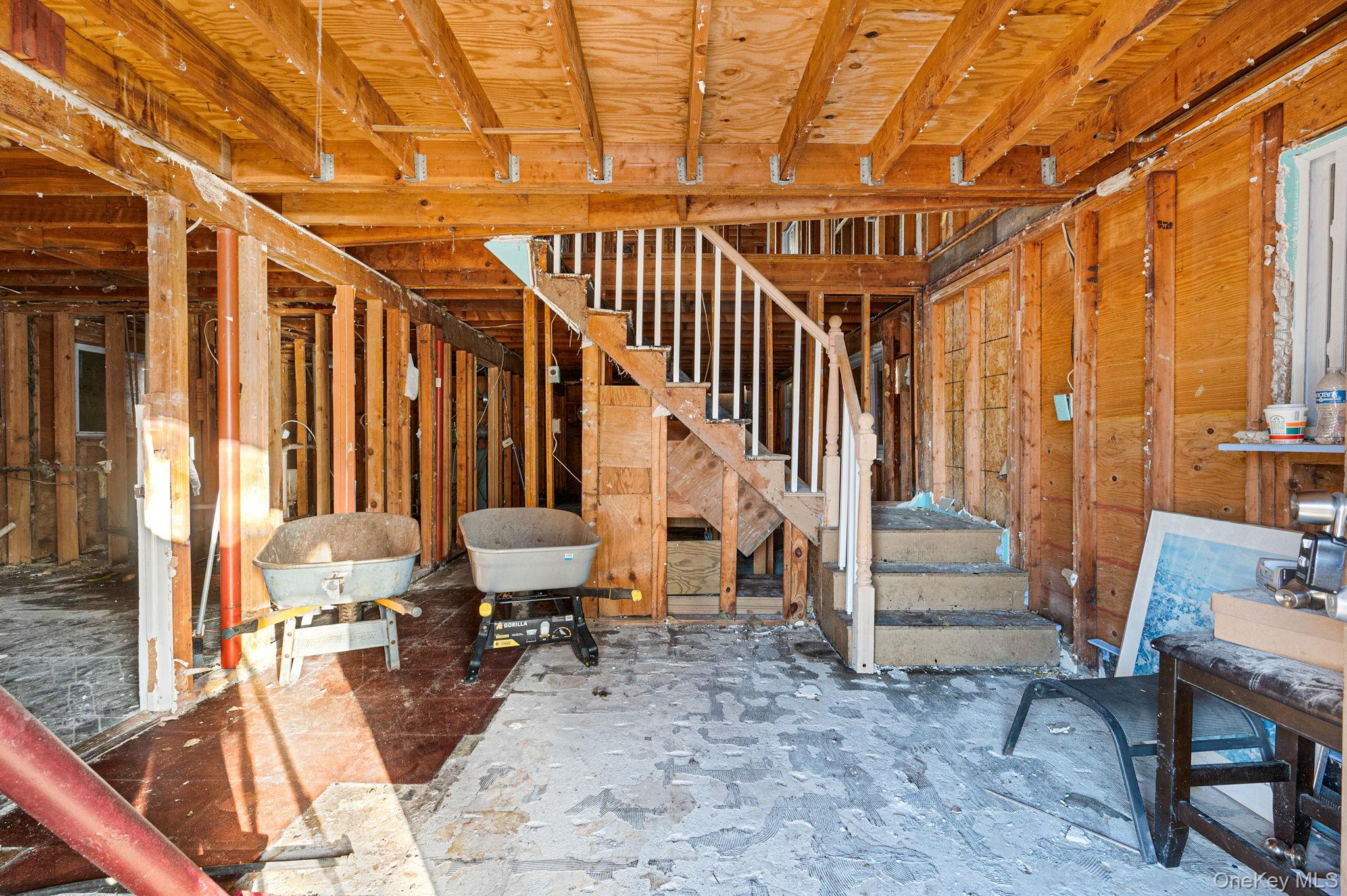 53 Hounslow Road Shirley, NY 11967 - Photo 3 of 18 a view of entryway and hall with wooden floor
