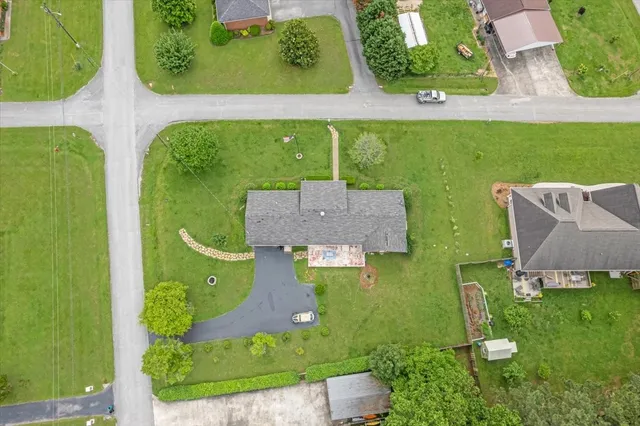 a view of a garden with a houses