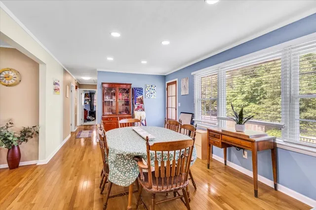 a view of a dining room with furniture window and outside view