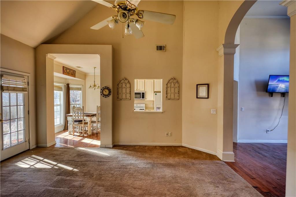 2648 Neighborhood Walk Villa Rica, GA 30180 - Photo 12 of 40 an empty room with windows and entrance