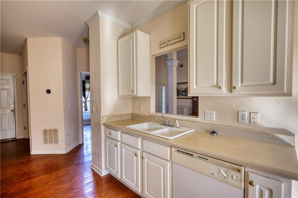 2648 Neighborhood Walk Villa Rica, GA 30180 - Photo 16 of 40 a utility room with cabinets washer and dryer