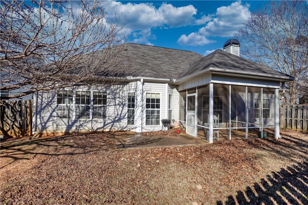 2648 Neighborhood Walk Villa Rica, GA 30180 - Photo 34 of 40 a view of a house with a yard