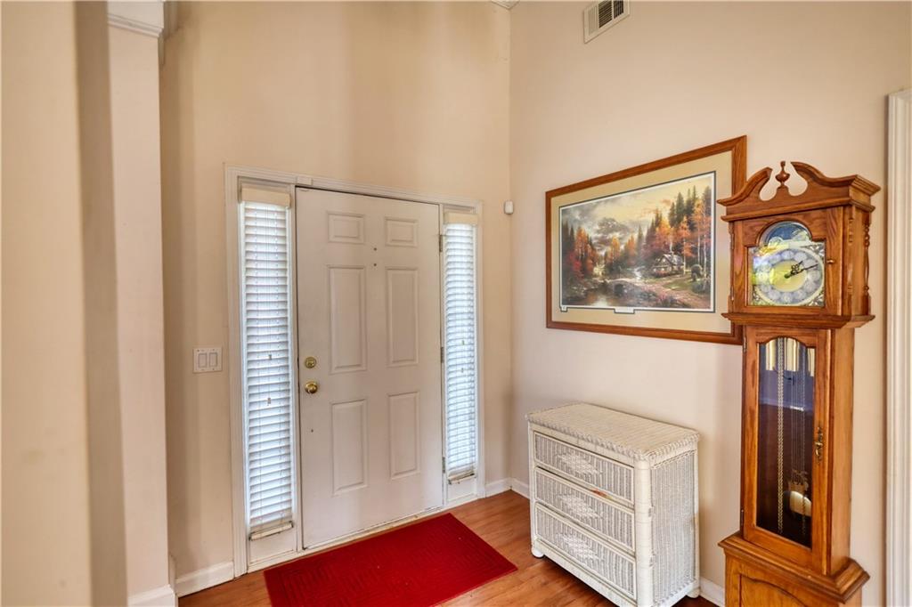 2648 Neighborhood Walk Villa Rica, GA 30180 - Photo 4 of 40 a view of a hallway with workspace