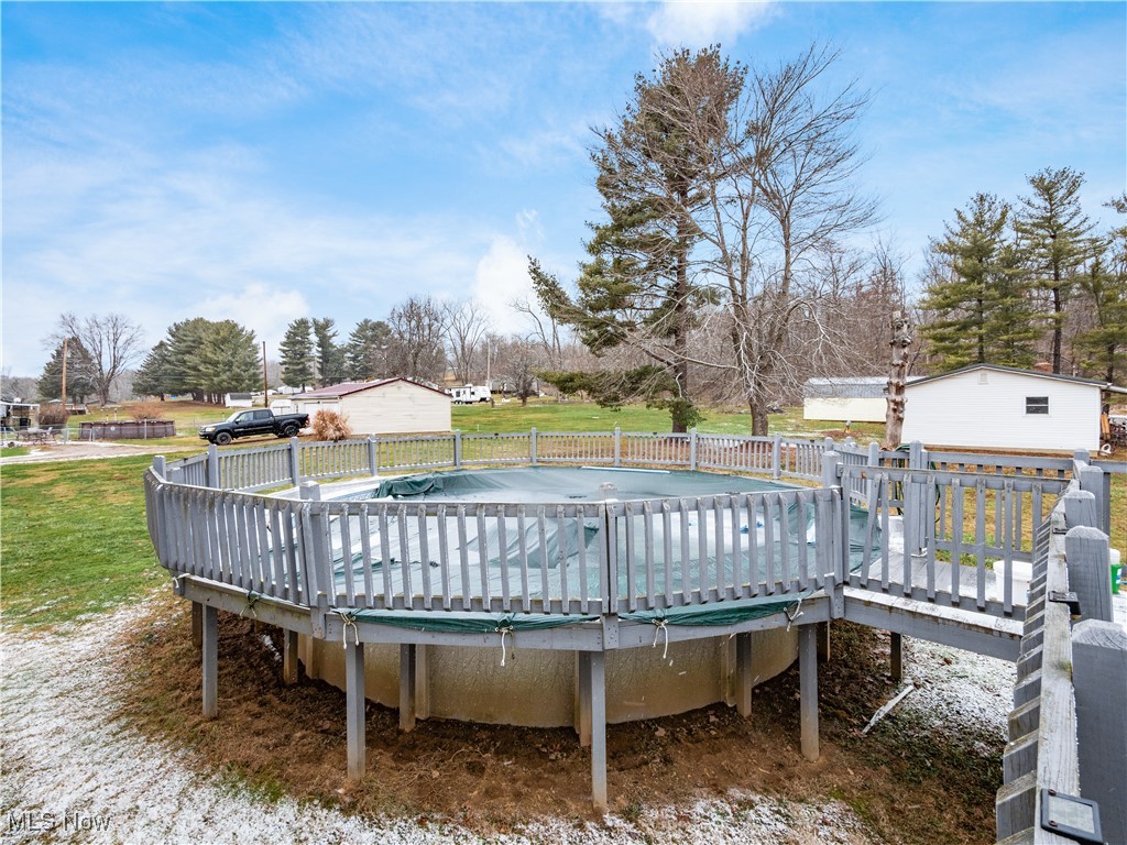 12454 Old Rainer Road Roseville, OH 43777 - Photo 30 of 33 View of pool with a wooden deck
