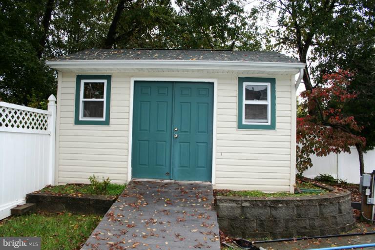 9303 Sandra Park Road Perry Hall, MD 21128 - Photo 19 of 25 a front view of a house